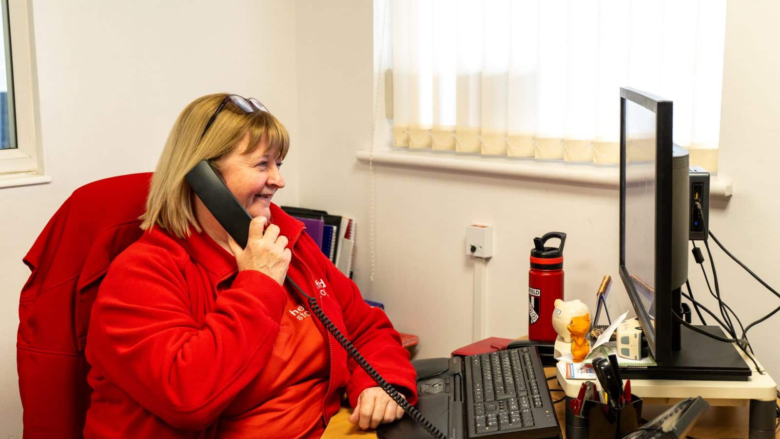Henfield Storage Horsham staff assisting customer at reception