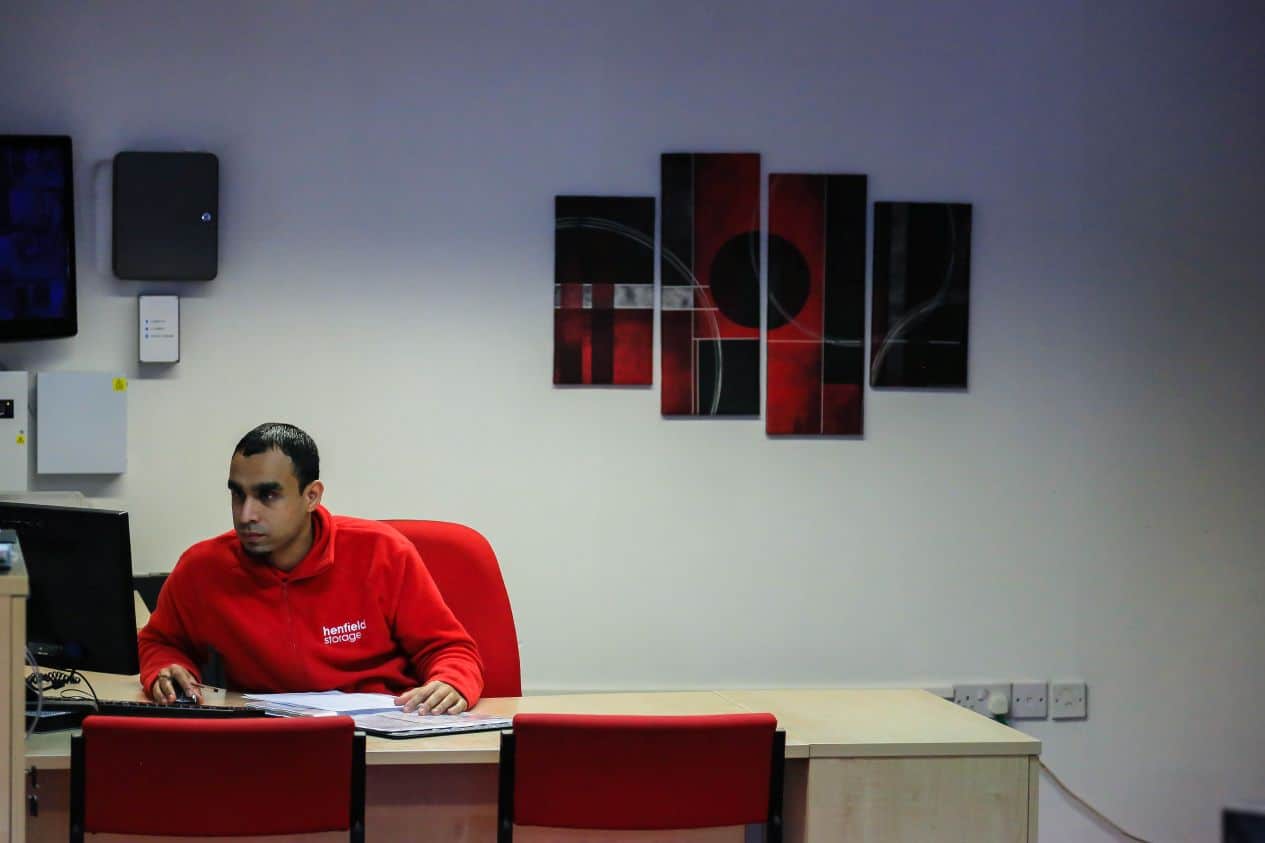 Henfield Storage Staples Corner staff assisting customer at reception