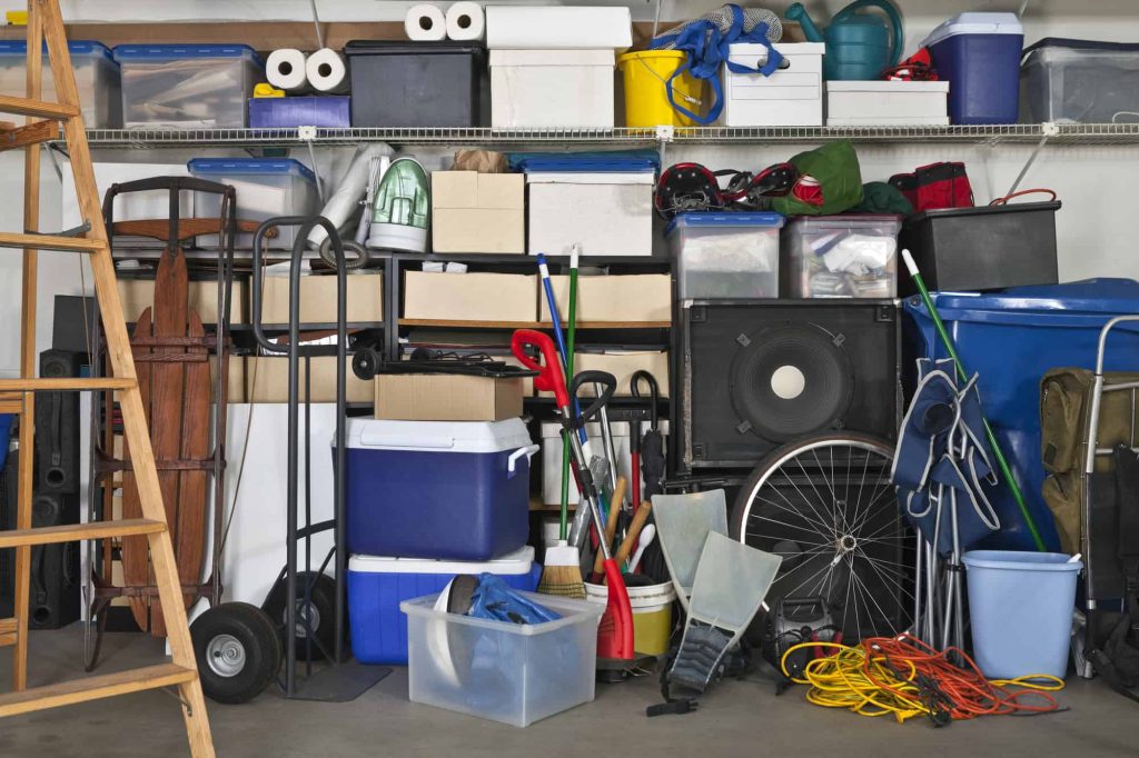 Boxes, coolers, sporting gear and tools in storage unit