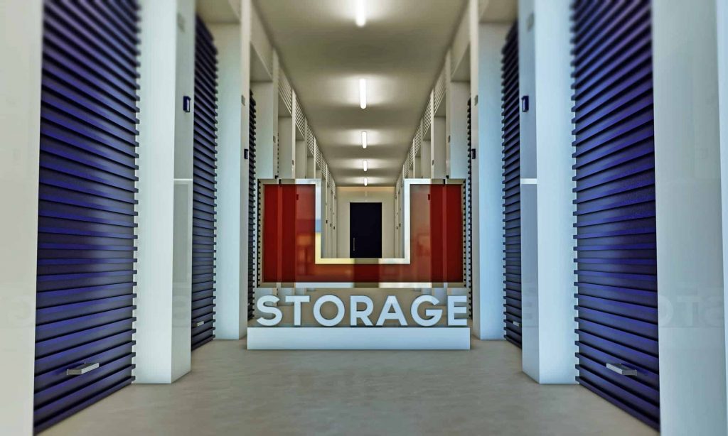 Storage facility hallway with red doors and lighting