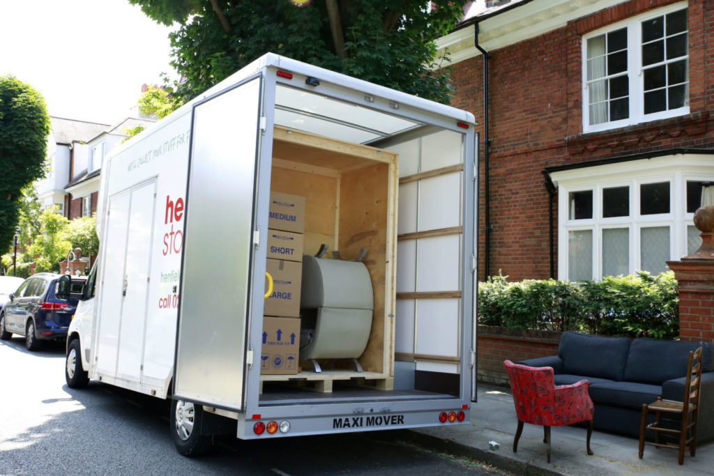 Henfield Storage van parked outside residential home during collection