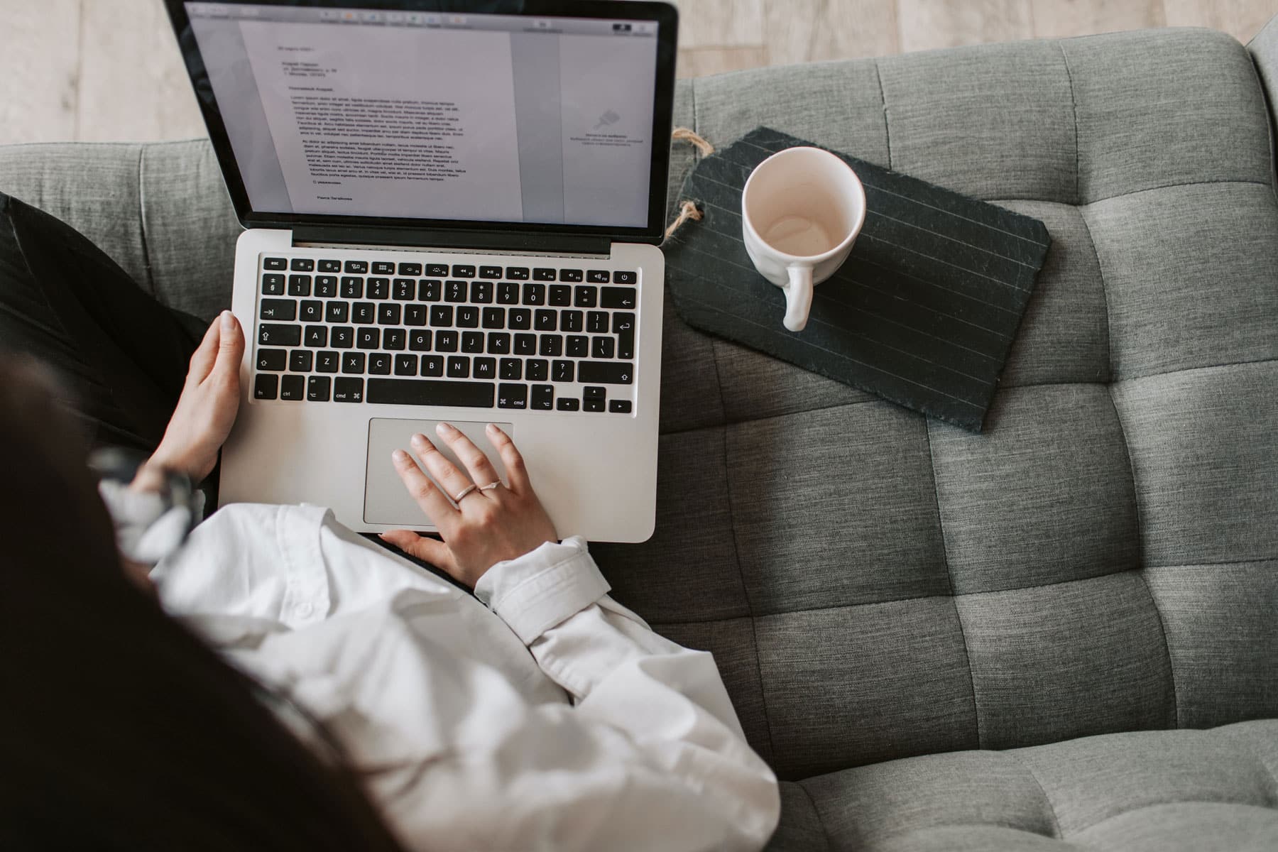 Business laptop and coffee cup